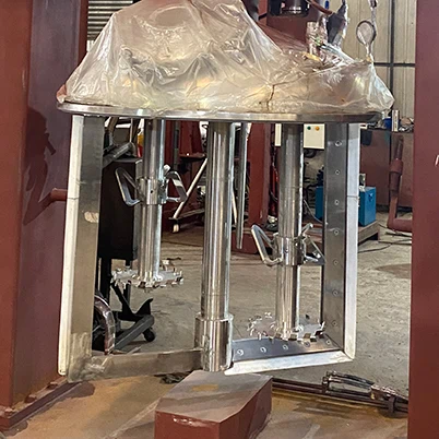 low speed anchor scraper and dual high speed dispersing discs on triple shaft mixer